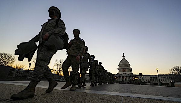 New Jersey National Guard soldiers and airmen arrive near the Capitol to set up security positions in Washington, D.C., Jan. 12, 2021. (U.S. Air National Guard photo by Master Sgt. Matt Hecht)